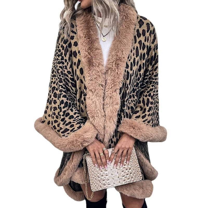 Woman wearing 2022 Winter Thick Warm Poncho with Fur Collar and Leopard Print, holding a stylish clutch.