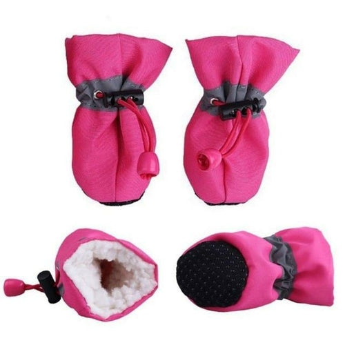 Set of four pink anti-slip winter warm shoes for dogs, featuring soft rubber soles and cozy lining, displayed in various angles.