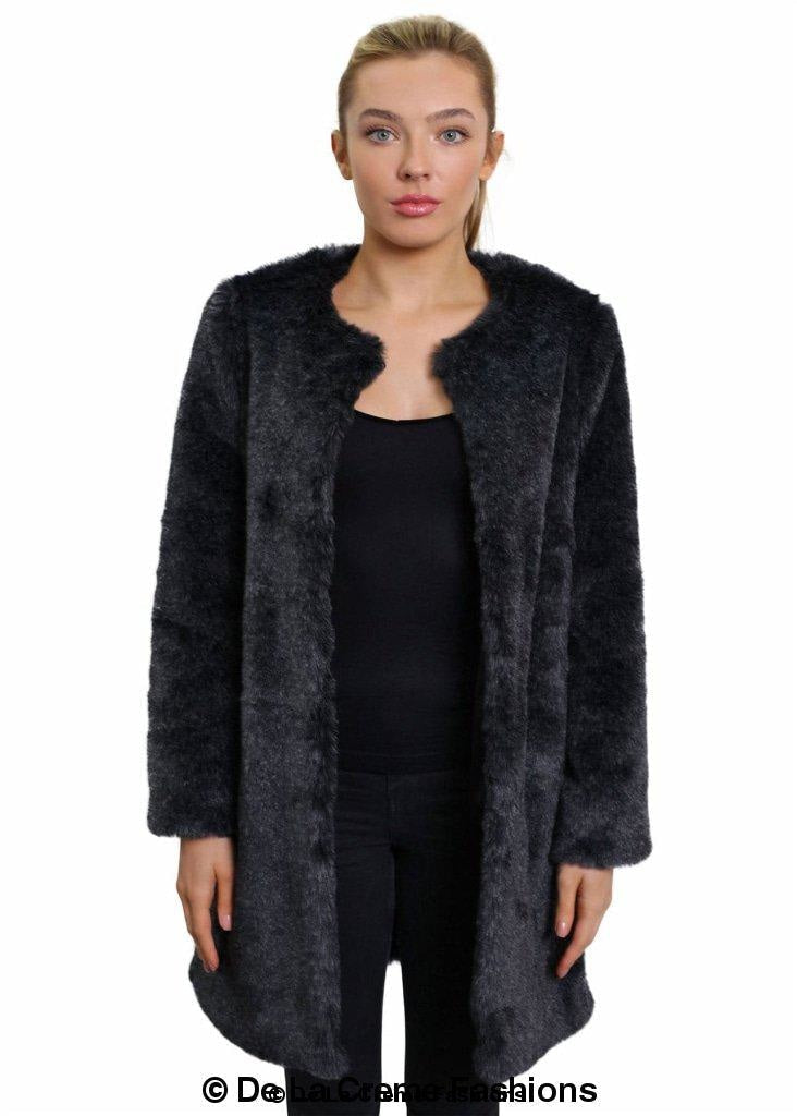 Woman modeling the De La Creme Women's Faux Fur Classic Coat in grey, showcasing elegant design and luxurious texture.