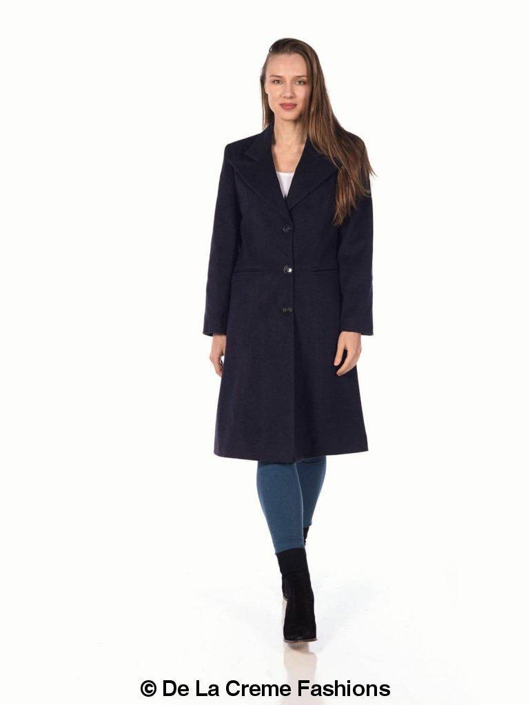 Woman wearing De La Creme Women's Mohair Blend Longline Winter Coat in navy blue, paired with blue jeans and black boots.