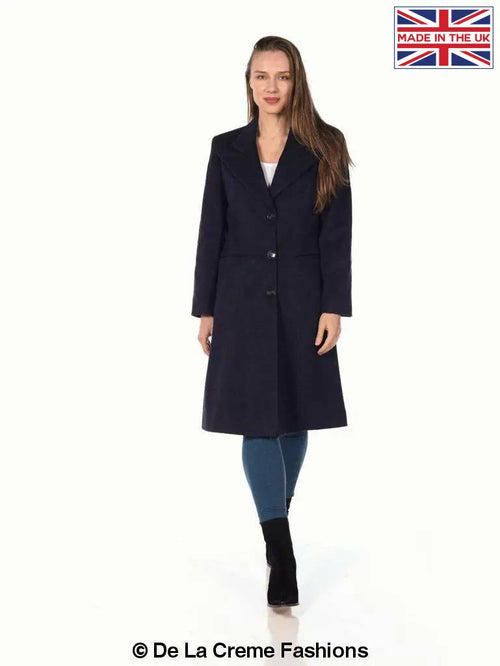 Woman modeling De La Creme Women's Mohair Blend Longline Winter Coat, single-breasted design, in studio setting, Made in the UK label visible.