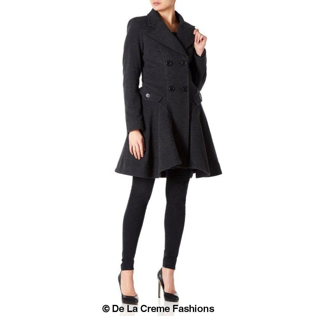 Woman modeling De La Creme Wool Blend Double Breasted Skater Coat (1102) with leggings and high heels.