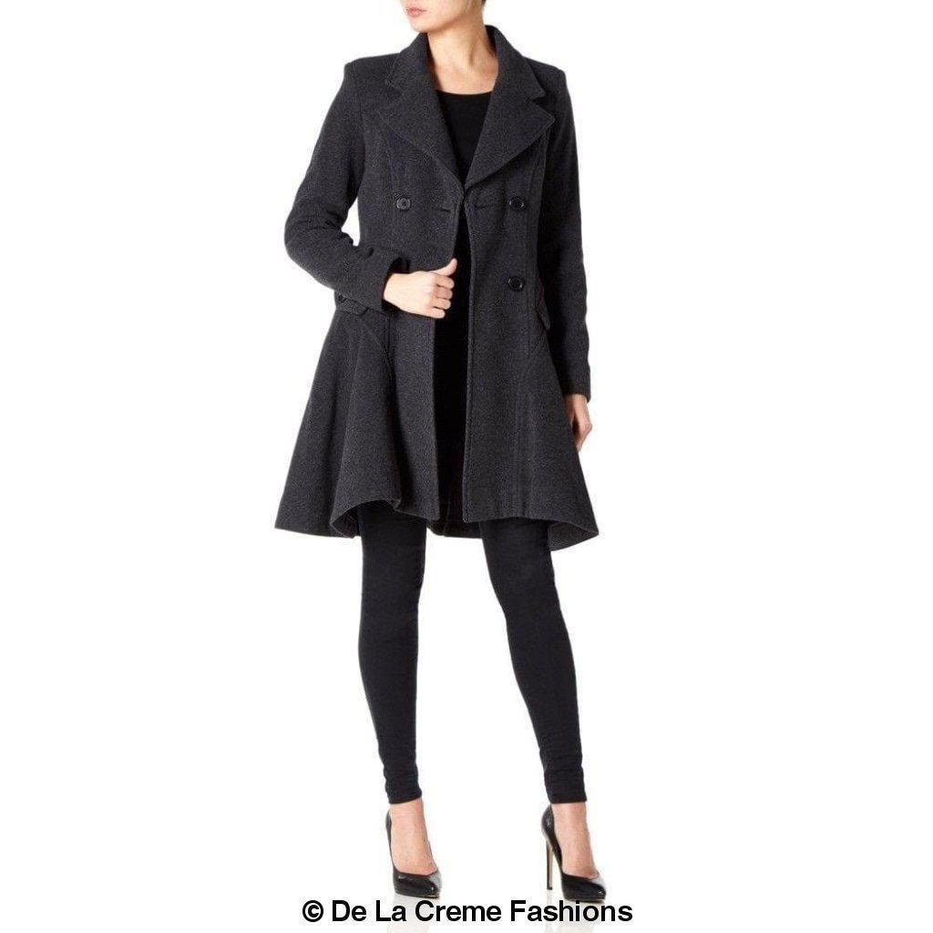 Woman wearing Wool Blend Double Breasted Skater Coat (1102) by De La Creme Fashions, styled with black leggings and heels.