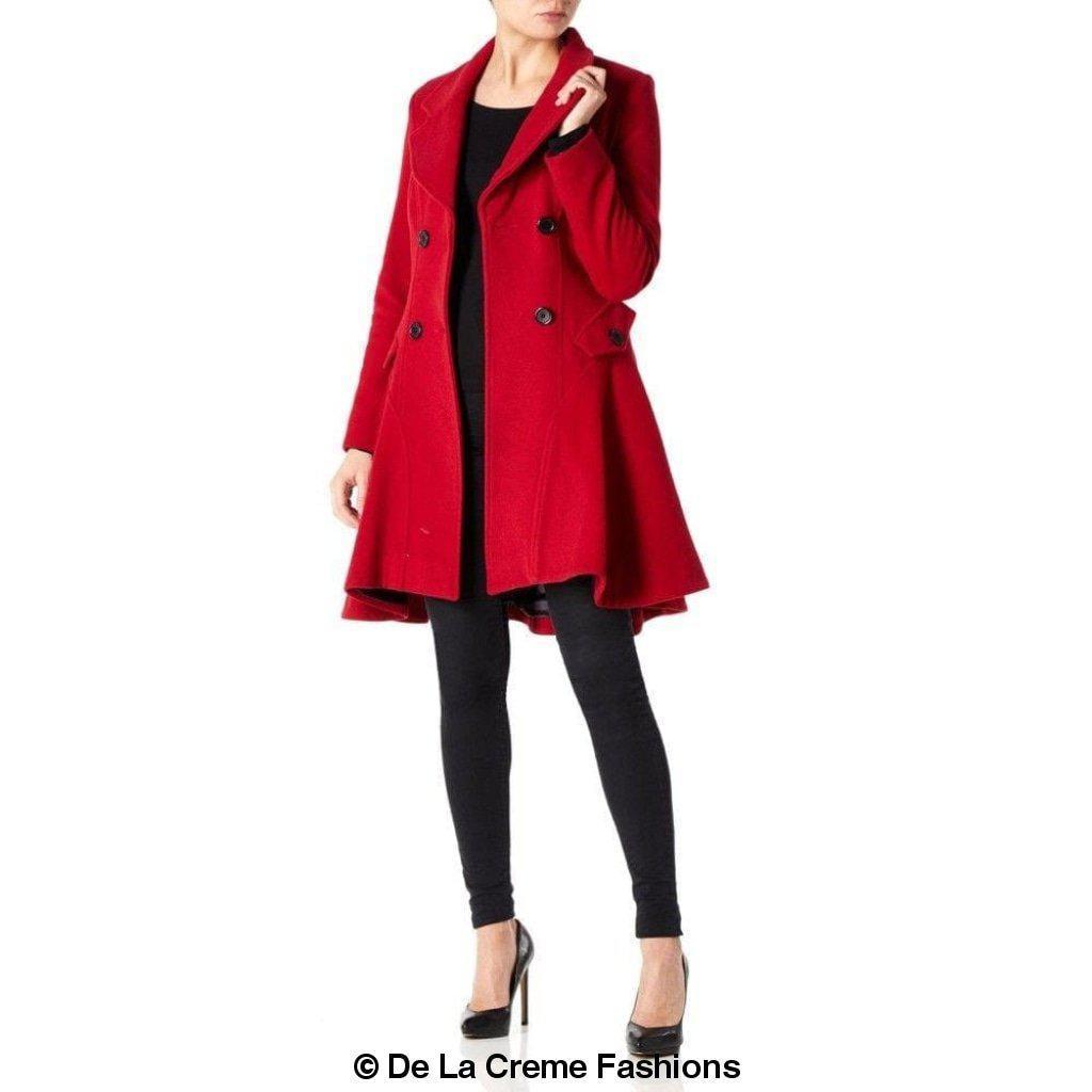 Woman in a red Wool Blend Double Breasted Skater Coat (1102) from De La Creme Fashions, styled with black pants and heels.