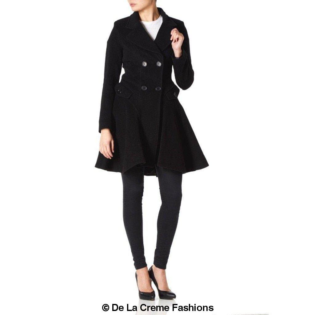 Woman modeling Wool Blend Double Breasted Skater Coat 1102 by De La Creme Fashions, featuring elegant buttons and side pockets.