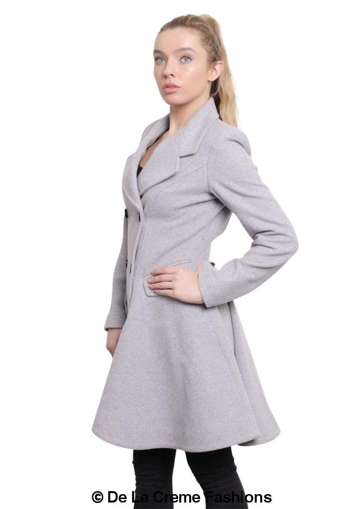 Woman in De La Creme Fashions wool blend double breasted skater coat, grey, showcasing side profile and elegant design