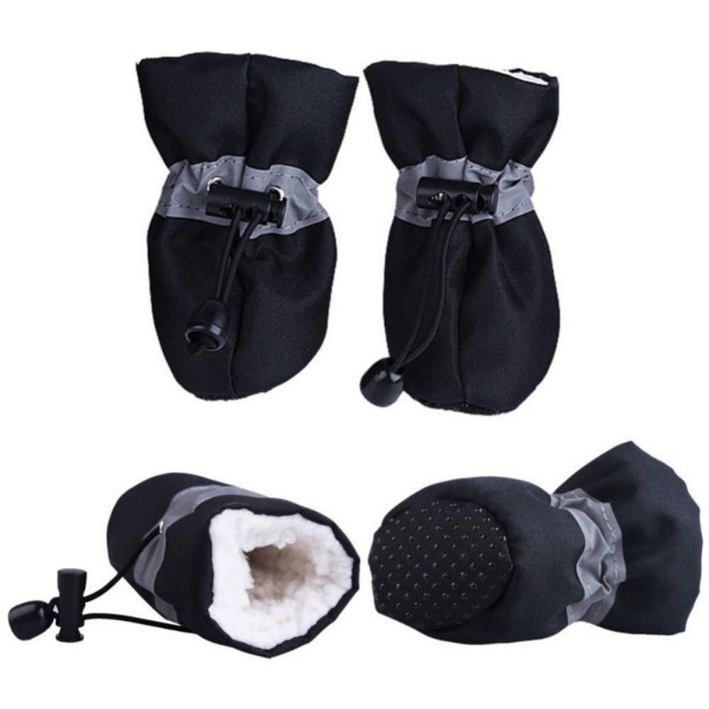 Set of four black dogs winter warm shoes with anti-slip soles and soft lining, displayed in various angles