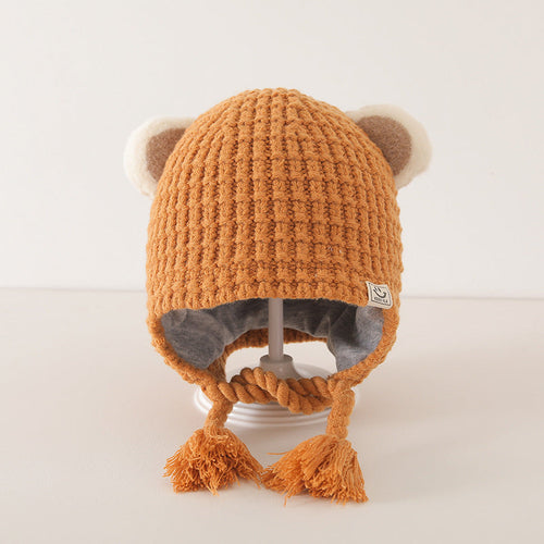 Warm orange plaid balaclava for baby with cute bear ears and tassels, crafted from soft cotton blend for comfort and style.