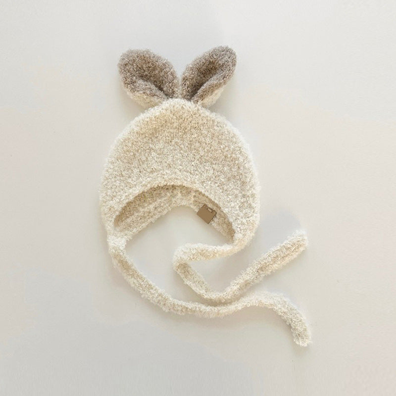 Warm fleece balaclava for baby with cute rabbit ears design in neutral colors, perfect for winter and autumn.